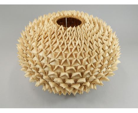 A Retro style woven raffia porcupine lamp shade, 37cm wide.