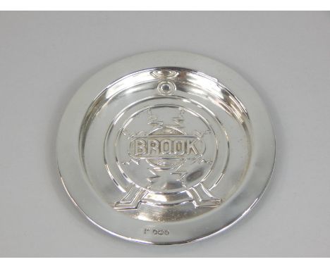 A George V silver dish, cast centrally with a vintage radio or speaker, titled Brook, Birmingham 1918, 3¼oz, 13cm diameter