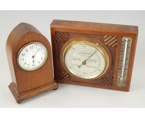 A rectangular barometer and thermometer, in walnut case, stamped Short & Mason, London, 25cm wide and a mantel clock, the dia