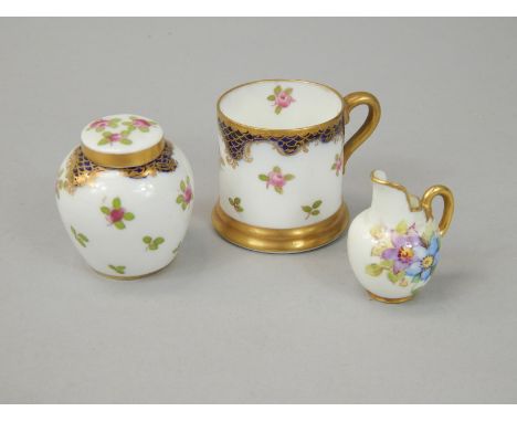 Three items of miniature porcelain, to include a Crown Staffordshire mug, decorated in Coalport style with flowers etc., a si