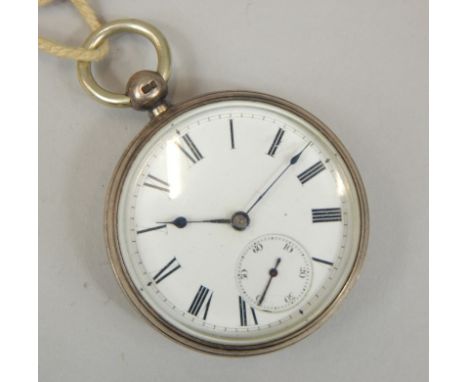 A Victorian silver pocket watch, having enamel dial with Roman numerals surrounded by minute track, with sunken second subsid