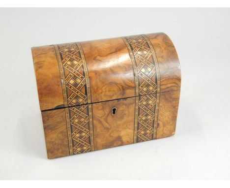 A Victorian walnut and parquetry tea caddy, the domed lid enclosing two lidded divisions, 20cm wide