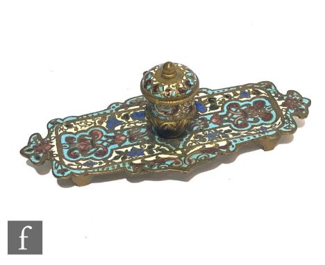 A 19th Century French Napoleon III cloisonne inkwell of fluted rectangular form with a central well, decorated with scrolls a