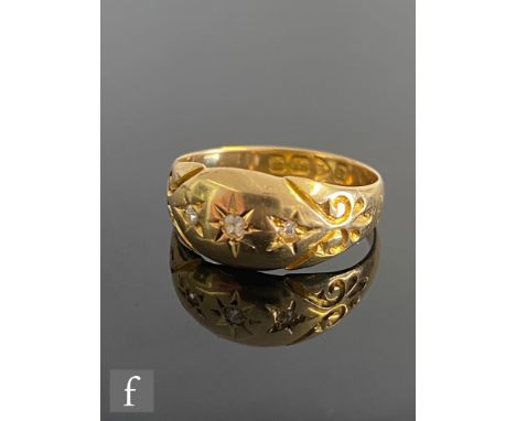 An early 20th Century 18ct hallmarked three stone gypsy set diamond boat shaped ring, weight 2.5g, ring size K, Chester 1916.