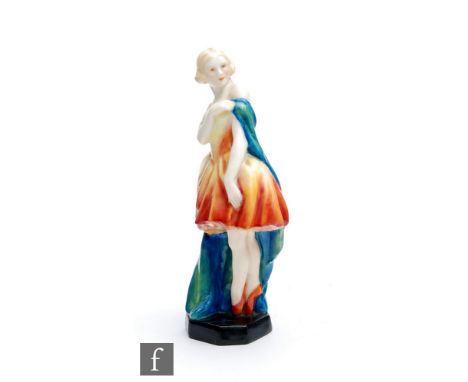 A Royal Worcester figurine titled Columbine modelled, by Doris Lindner, as a ballerina dressed in an orange and yellow tutu w