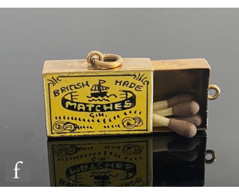 A 9ct hallmarked novelty charm modelled as a box of British Made matches with yellow and black enamel logo to front and strik