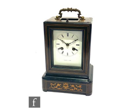 A late 19th Century mantle clock, the white square enamel dial signed Vargues a Paris, eight day striking movement in marquet