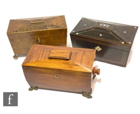 A 19th Century yew wood sargophagal tea caddy with fitted canister interior, width 31cm, a similar mahogany example, width 37