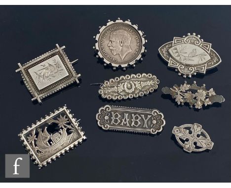 Eight assorted hallmarked silver and unmarked white metal Victorian and later brooches to include a mounted George V crown, a