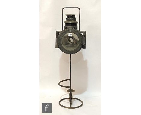 An Osmeka railway permanent way lamp, on stand, to take a gas canister. 