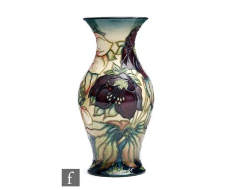 A Moorcroft Pottery vase decorated in the Hellebore pattern designed by Nicola Slaney, impressed mark and signed N. Slaney in