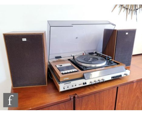 An early 1980s Sony MHK - 40A record player belt driven turntable, with built in cassette deck and radio, serial no. 606253, 