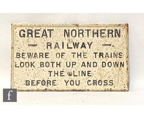 A cast iron sign for Great Northern Railway 'Beware of the Trains', 31.5cm x 56cm, and a forty shillings penalty 'failure to 