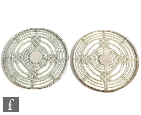 A pair of early 20th Century circular glass teapot stands each with silver overlay geometric decoration, diameter 11.5cm. (2)