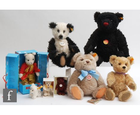 A collection of teddy bears, comprising four Steiff teddy bears with yellow tags comprising 003516, 005985, 027987 and 660931