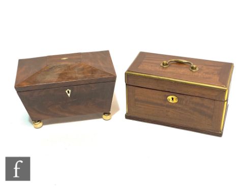 A small 19th Century mahogany sargophagal shaped tea caddy with fitted two divisions, on ivory feet, width 16cm, and a mahoga