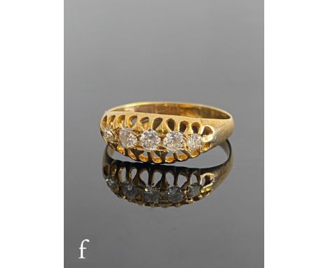 An early 20th Century 18ct five stone diamond boat shaped ring, claw set stones to plain shoulders, weight 1.6g, ring size K 