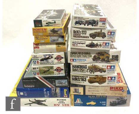 Seventeen assorted Military and aircraft related plastic model kits of various scales and manufacturers, to include Revell, T