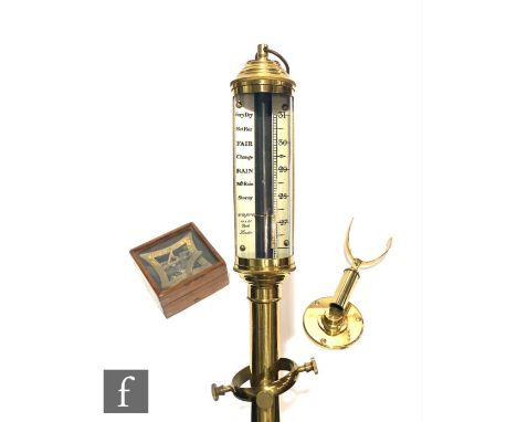 A 20th Century brass marine stick barometer by H D F Y C London, on a Gimbel mount, length 90cm, and a replica brass astronom