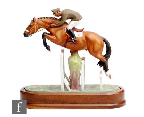 A limited edition Royal Worcester Equestrian Statuette of Merano and Cap. Raimondo d'Inzeo, numbered 484 of 500, with certifi