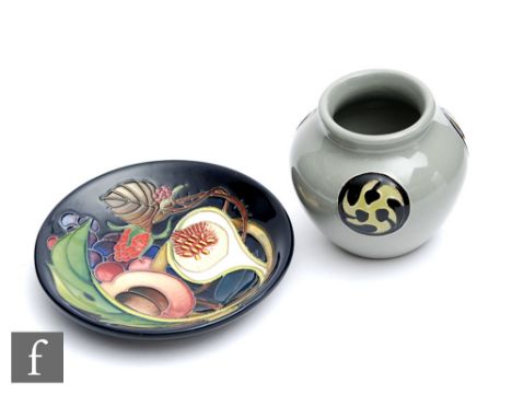 Two pieces of Moorcroft Pottery comprising a Queen's Choice pattern pin dish decorated in the Queen's Choice pattern designed