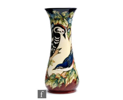 A Moorcroft Pottery vase decorated in the Ingleswood pattern designed by Philip Gibson, impressed mark, boxed, height 31cm. 