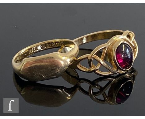A 9ct single stone garnet ring in the Celtic style, weight 3g, ring size R, with a 9ct signet ring, weight 3.4g, ring size N.