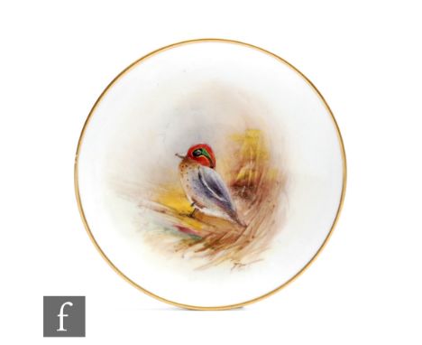 A small hand painted Royal Worcester pin dish decorated with a hand painted teal, titled verso, indistinctly signed, grey mar