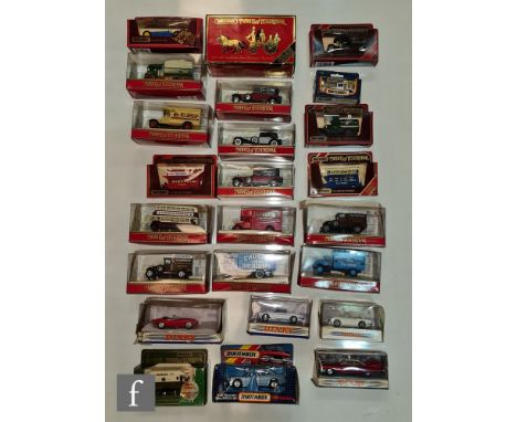 An assorted collection of mostly Matchbox Models of Yesteryear diecast models to include Y21 Ford Model TT, Y23 Ace Omnibus, 