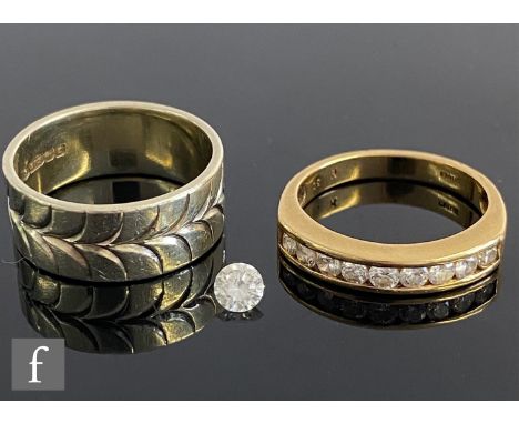 An 18ct diamond nine stone half eternity ring, channel set stones weight 3.8g, ring size K 1/2, with a 9ct wedding ring, weig