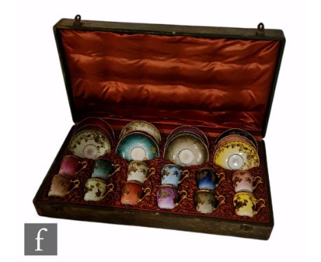 A cased set of twelve early 20th Century Haviland &amp; Co Limoges coffee cups and saucers each decorated in the Art Nouveau 