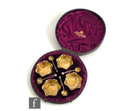 A cased set of four hallmarked silver open salts with gilt bowls and conforming spoons, Birmingham&nbsp; 1885,&nbsp;John Grin