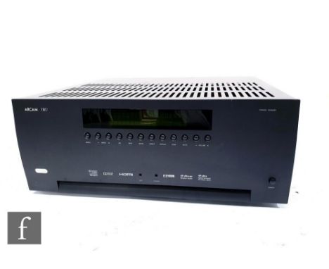 An Arcam AVR 450 power amplifier AV receiver, serial no. FV45R01059, with original packaging, remote control and cabling. 