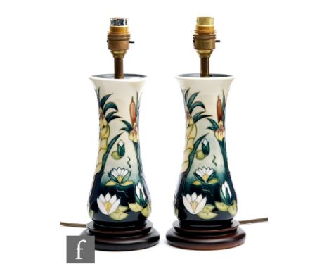 AMENDED DESCRIPTION A pair of Moorcroft Pottery table lamps decorated in the Lamia pattern designed by Rachel Bishop, both wi