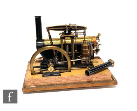 'Mary', a live steam beam engine with vertical boiler designed by Tubal Cain, fly wheel diameter 8", housed in a glazed displ
