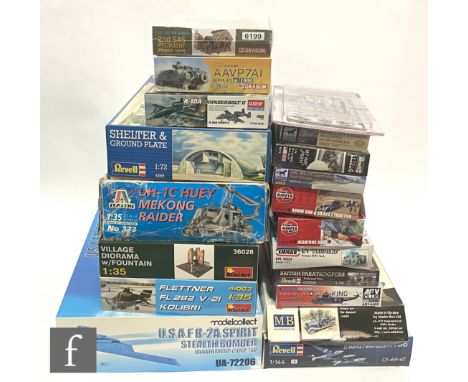 Nineteen military related plastic model kits of various scales and manufacturers including Model Collect, Revell, Italeri, MB