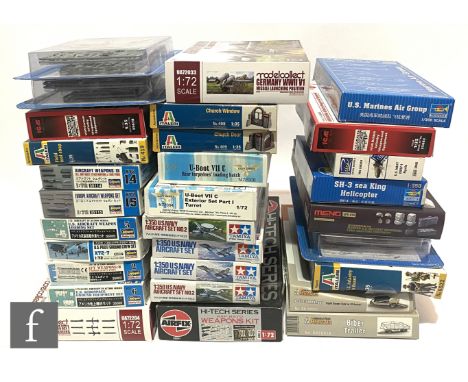 A quantity of military related weapons and accessories plastic model kits, of various scales and manufacturers including Tami