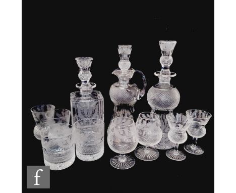 A part suite of 20th Century Edinburgh Crystal table glass to comprise a thistle shape claret, thistle shape decanter, tradit