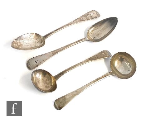 A pair of hallmarked silver old English pattern table spoons with a pair of silver ladles, total weight 10oz, London 1824 and