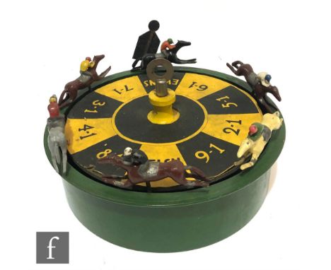 A 1930s Trueline Tool Co. Victory Race Game with cast horses on revolving drum, with instruction sheet and box. 