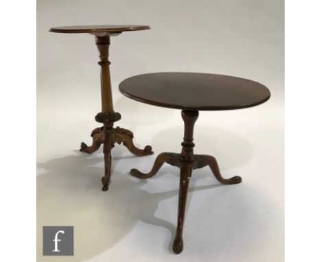 A mahogany supper table in the George III style, the circular top above a turned pedestal and tripod base, height 53cm and di