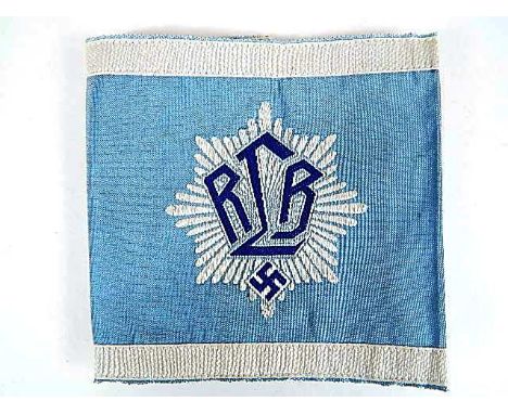 GERMAN RLB AIR WARNING SERVICE SILK ARMBAND bearing an embroidered RLB device with white ribbon borders, on light blue ground
