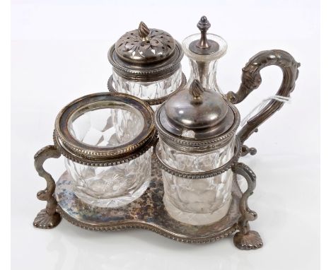 Victorian silver cruet frame of trefoil form, with beaded borders and leaf scroll handle, on three stylised shell feet, conta