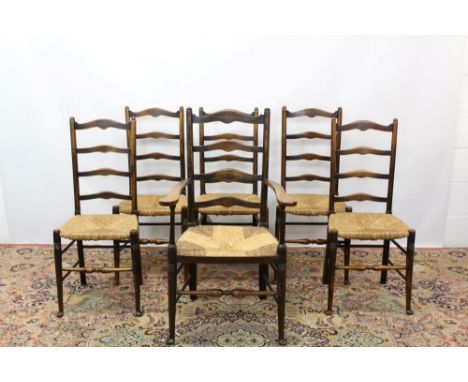 Long set of nine late 19th / early 20th century beech and rush seated ladder back chairs, each of typical delicate form on ri