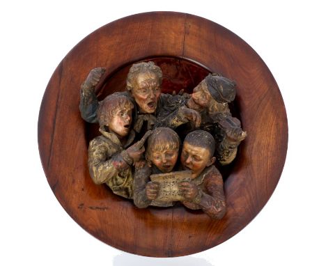 Late 19th century Austro-Hungarian cold painted terracotta wall plaque of roundel form, modelled in high relief as a choral g