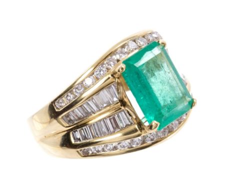 Emerald and diamond cocktail ring with a rectangular step cut emerald estimated to weigh approximately 2.23 carats, in four-c