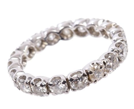 Diamond eternity ring with a full band of nineteen brilliant cut diamonds estimated to weigh approximately 1.60 carats in tot