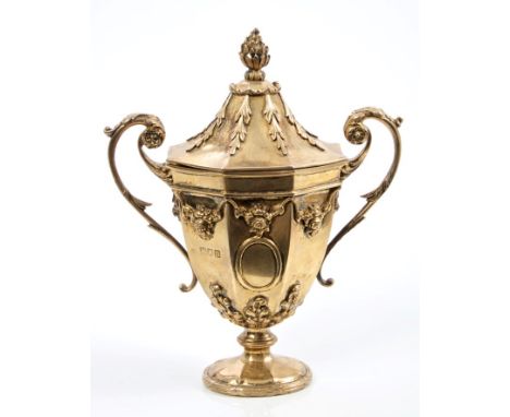 Fine quality Edwardian silver gilt tea caddy in the form of a classical urn, with applied floral decoration, vacant cartouche