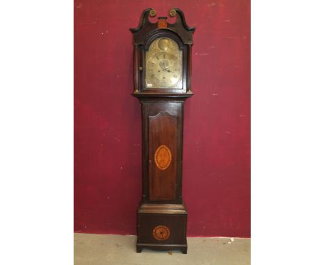 18th century longcase clock with eight day movement and 12 inch brass breakarch dial, face mask spandrels, matted centre, sub