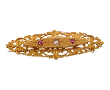 Victorian oval plaque brooch with a central ruby and seed pearl cluster and glazed locket compartment to reverse, stamped 15c
